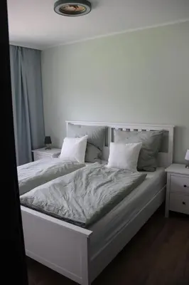 Ein Bett oder Betten in einem Zimmer der Unterkunft Harzbutze 60