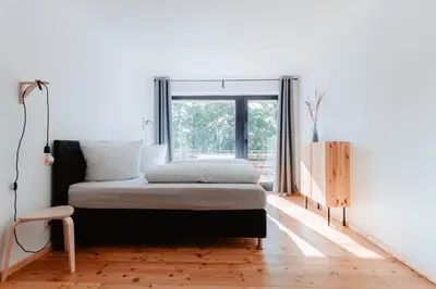 Ein Bett oder Betten in einem Zimmer der Unterkunft Granetal.Quartier