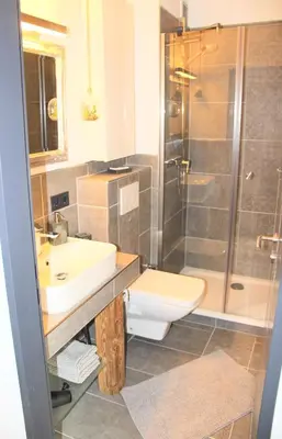 Ein Badezimmer in der Unterkunft Harzbutze 30