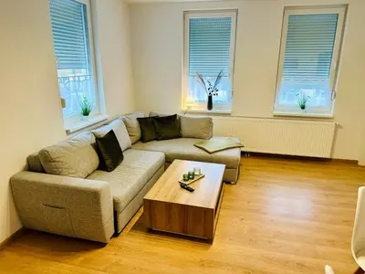 Ein Sitzbereich in der Unterkunft FeWo Buche mit Balkon #Netflix #Innenstadtnähe von Harztraveler