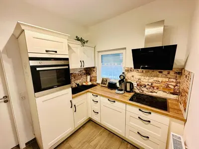 Küche/Küchenzeile in der Unterkunft FeWo Buche mit Balkon #Netflix #Innenstadtnähe von Harztraveler