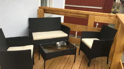 Ein Sitzbereich in der Unterkunft FeWo Esche mit Balkon #Netflix #Innenstadtnähe von Harztraveler