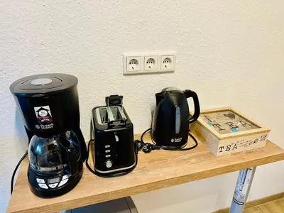 Kaffee-/Teezubehör in der Unterkunft FeWo Bergahorn mit Wintergarten #Fernblick#Netflix und vieles mehr von Harztraveler