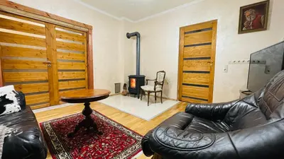 Ein Sitzbereich in der Unterkunft Gemütliches Apartment mit Kamin und Wohnküche