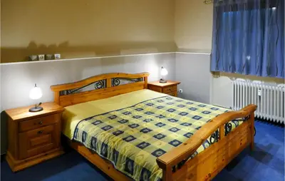 Ein Bett oder Betten in einem Zimmer der Unterkunft Nice Apartment In Hahnenklee With Wifi