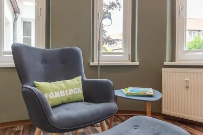 Ein Sitzbereich in der Unterkunft WR Grüne Ferienwohnung in der alten Apotheke