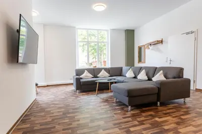 Ein Sitzbereich in der Unterkunft WR Grüne Ferienwohnung in der alten Apotheke