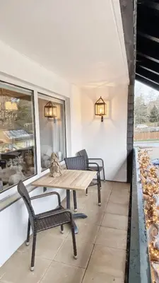 Ein Sitzbereich in der Unterkunft HOME Suites Apartment 5