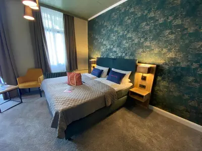 Ein Bett oder Betten in einem Zimmer der Unterkunft Harz Hotel & Spa Seela
