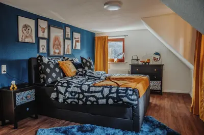 Ein Bett oder Betten in einem Zimmer der Unterkunft Hütte54