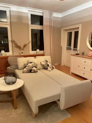 Ein Bett oder Betten in einem Zimmer der Unterkunft Ferienwohnung: Villa Eichbaum