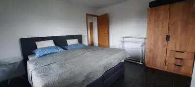 Ein Bett oder Betten in einem Zimmer der Unterkunft Fewo 2