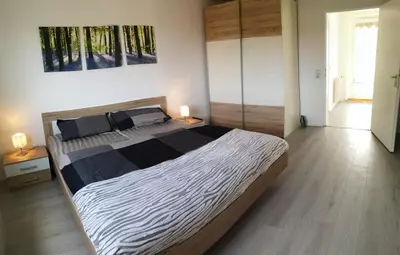 Ein Bett oder Betten in einem Zimmer der Unterkunft Fewo Penthouse am Wildpark