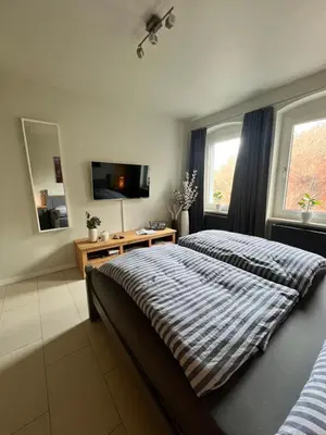 Ein Bett oder Betten in einem Zimmer der Unterkunft Wanderunterkunft am Hexentanzplatz O