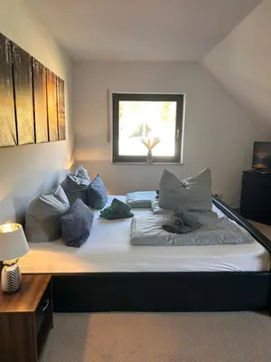 Ein Bett oder Betten in einem Zimmer der Unterkunft Apartment am Park