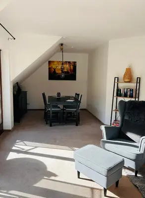 Ein Sitzbereich in der Unterkunft Apartment am Park
