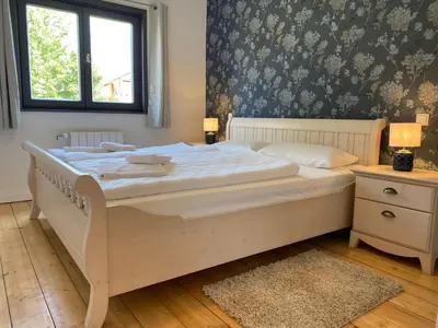 Ein Bett oder Betten in einem Zimmer der Unterkunft Ferienhaus 