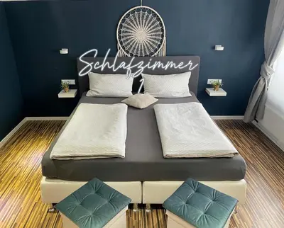 Ein Bett oder Betten in einem Zimmer der Unterkunft Ferienwohnung 1-4 Personen in Goslar