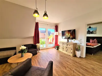 Ein Sitzbereich in der Unterkunft Ferienwohnungen Burgfried