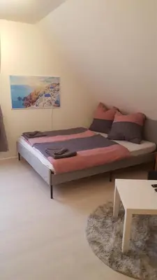 Ein Bett oder Betten in einem Zimmer der Unterkunft Kleine Oase bei Nina