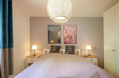 Ein Bett oder Betten in einem Zimmer der Unterkunft FeWo Rosi