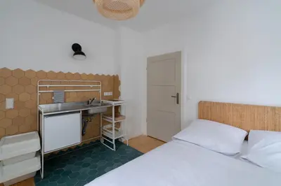 Ein Bett oder Betten in einem Zimmer der Unterkunft Klein aber OHO!