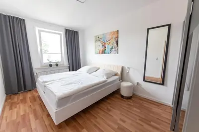 Ein Bett oder Betten in einem Zimmer der Unterkunft Ferienwohnung Martin 3 und 4