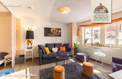 Ein Sitzbereich in der Unterkunft Apartments Unter Dem Schloß