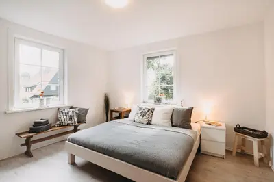 Ein Bett oder Betten in einem Zimmer der Unterkunft Haus Hegemeister