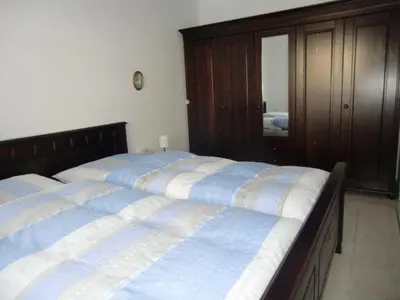 Ein Bett oder Betten in einem Zimmer der Unterkunft Fewo Eiche