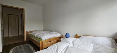 Ein Bett oder Betten in einem Zimmer der Unterkunft Fewo Esche 2