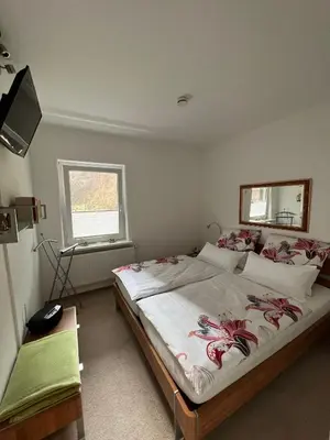 Ein Bett oder Betten in einem Zimmer der Unterkunft Fewo Berlik
