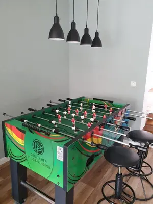 Eine Spielezimmer in der Unterkunft Ferienhaus 