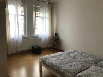 Ein Bett oder Betten in einem Zimmer der Unterkunft Helles Apartment