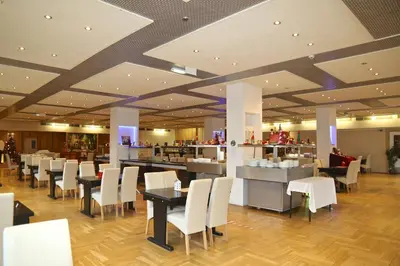 Ein Restaurant oder anderes Speiselokal in der Unterkunft Carea Harz Hotel Allrode