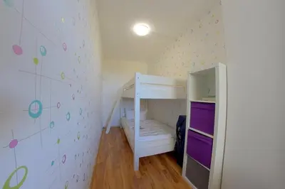 Ein Bett oder Betten in einem Zimmer der Unterkunft Apartment 240