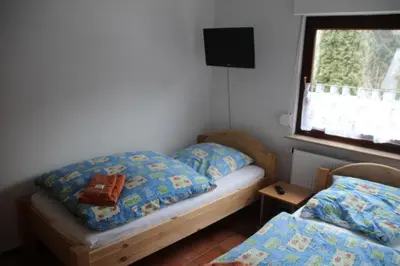 Ein Bett oder Betten in einem Zimmer der Unterkunft Ferienwohnung Waldwichtel