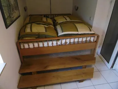 Ein Bett oder Betten in einem Zimmer der Unterkunft Gartenwohnung Bodetalblick