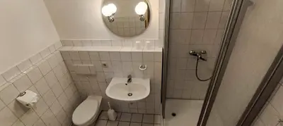 Ein Badezimmer in der Unterkunft Gasthof 