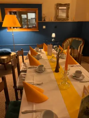 Ein Restaurant oder anderes Speiselokal in der Unterkunft Gasthof 