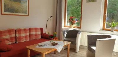 Ein Sitzbereich in der Unterkunft Ferienwohnung Gerlach