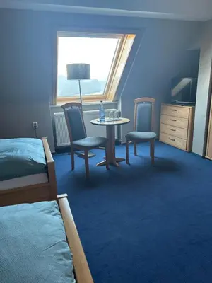 Ein Sitzbereich in der Unterkunft Pension 