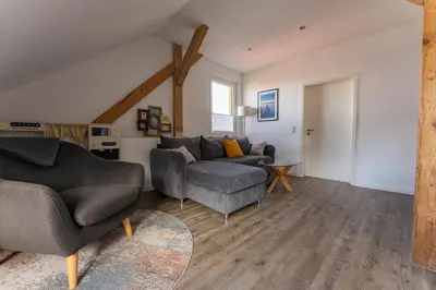 Ein Sitzbereich in der Unterkunft Ferienwohnung am Steinbach 2