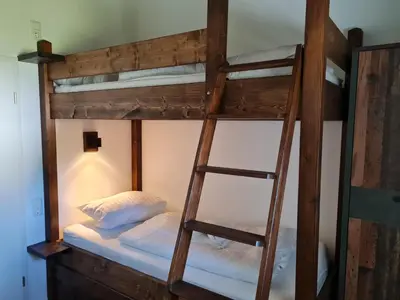 Ein Bett oder Betten in einem Zimmer der Unterkunft Haus DeMa