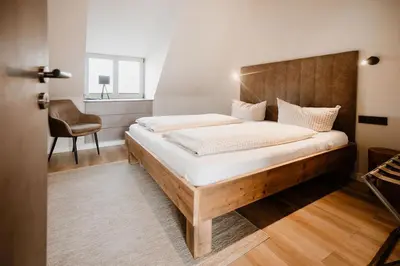 Ein Bett oder Betten in einem Zimmer der Unterkunft FourElements