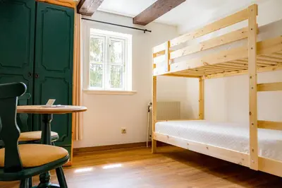 Ein Bett oder Betten in einem Zimmer der Unterkunft Hotel & Restaurant Brauner Hirsch Osterwieck