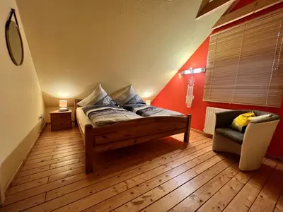Ein Bett oder Betten in einem Zimmer der Unterkunft Haus Krönchen