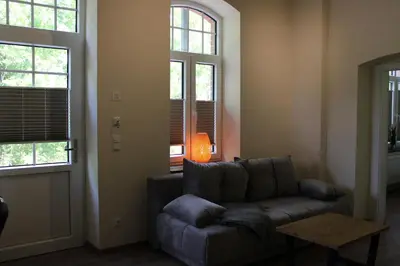 Ein Sitzbereich in der Unterkunft Bahnhof Gleis 72 - Ferienwohnungen