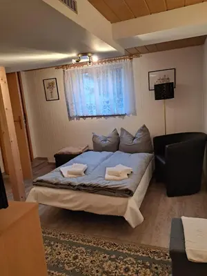 Ein Bett oder Betten in einem Zimmer der Unterkunft Haus Erna Schierke