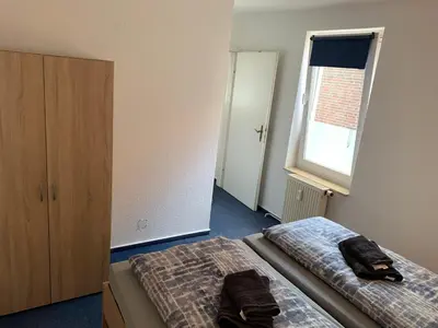 Ein Bett oder Betten in einem Zimmer der Unterkunft 2-Zimmer-Wohung Langelsheim Astfeld